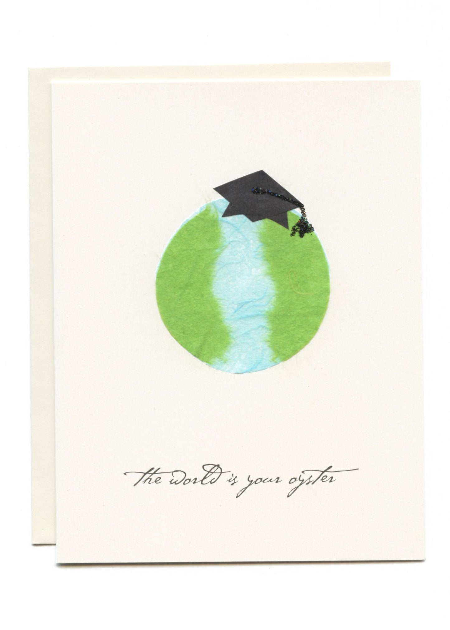 "The World is Your Oyster" Grad Cap on Globe